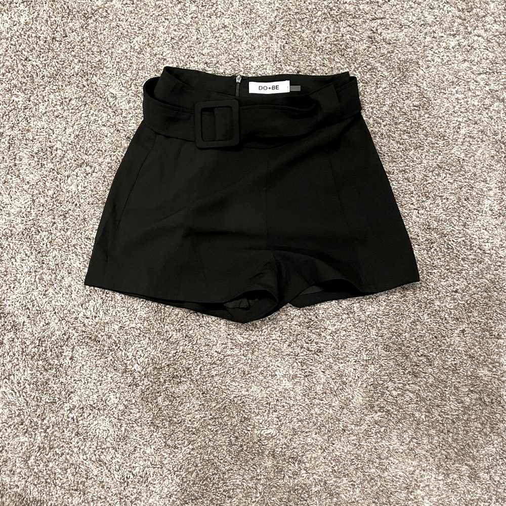Black belted shorts.